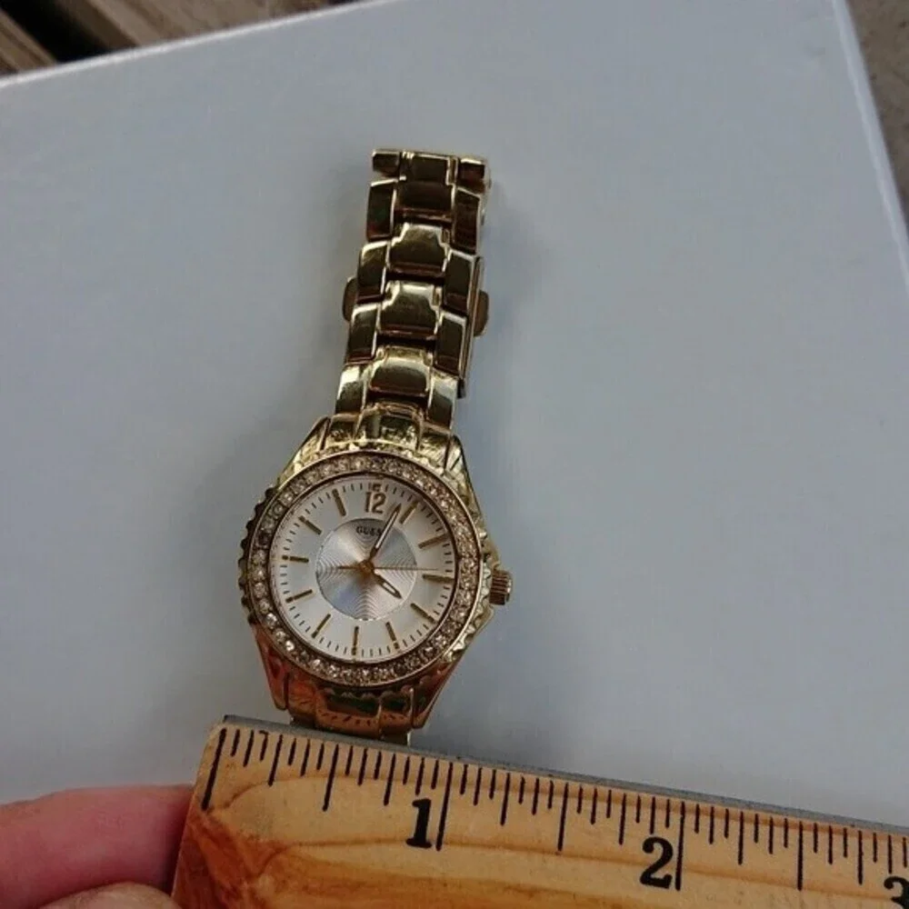 Guess Analog gold tone with rhinestones Watch